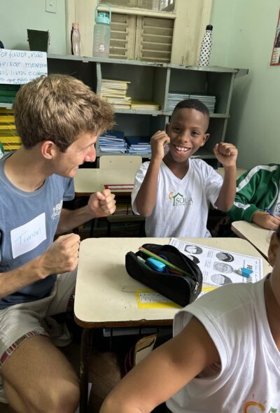 Encouraging A child and a young man being cheerful and happy.