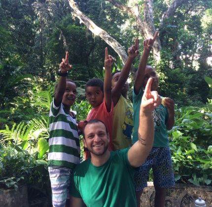 The four boys on our after-school program and volunteer Gabriele point to a monkey in the trees in Parque Lage, Rio de Janeiro