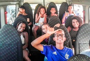 EduMais's Community English Program Group in the minibus on the way to the National Museum in Rio de Janeiro