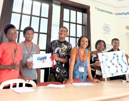6 Kids presenting their board game Favela students from EduMais proudly presenting their handmade board game ‘Trash Catch’ during a game design class in Rio de Janeiro
