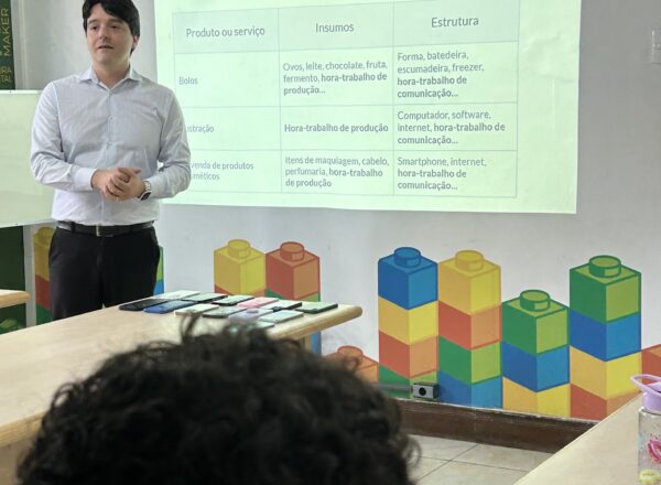 Man presenting cost structure.