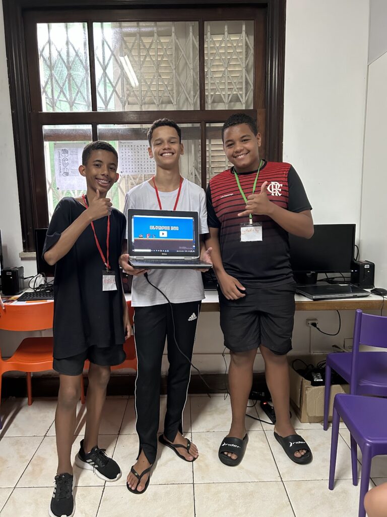 Pietro and computer game three boys showing a computer game